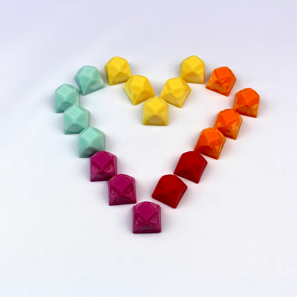 Highly scented soy wax melt samples shaped as a loveheart.