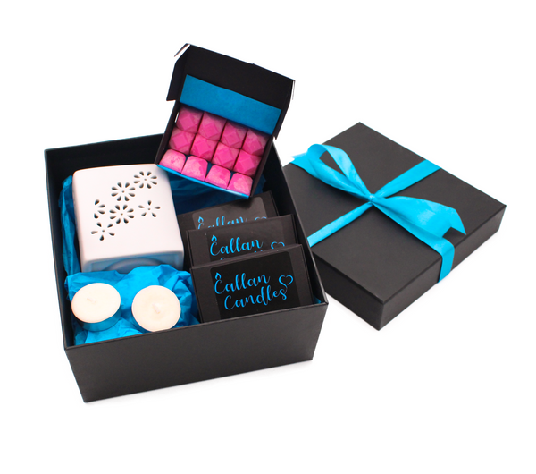 Scented soy wax melt gift box with white ceramic melter and two soy wax tealights.
